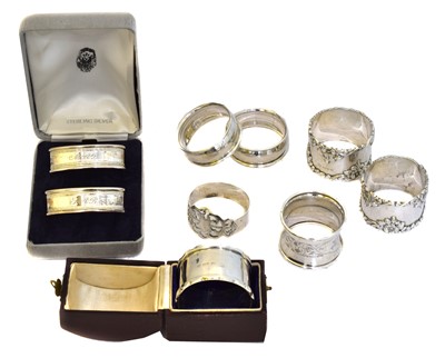 Lot 155 - A selection of silver napkin rings