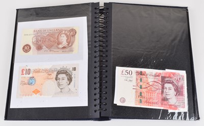 Lot 95 - Twenty-five Bank of England banknotes in an album (25).