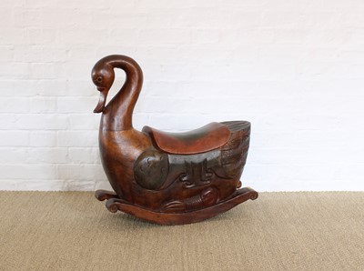 Lot 298 - An Indonesian Hardwood Rocking Chair