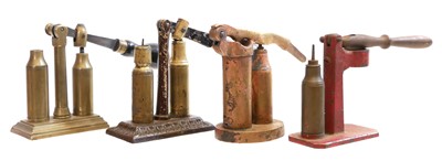 Lot 410 - Four shotgun decapper / recapper tools.