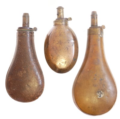 Lot 382 - Two copper and brass powder flasks and a...