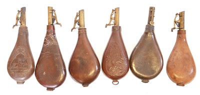 Lot 472 - Six leather and brass shot flasks, one of...