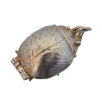 Lot 30 - A 'The Beatles' beetle pendant.