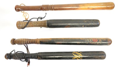 Lot 241 - Four Victorian police truncheons, one stamped...