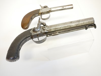 Lot 14 - Two percussion pistols, the first, an 18 bore...