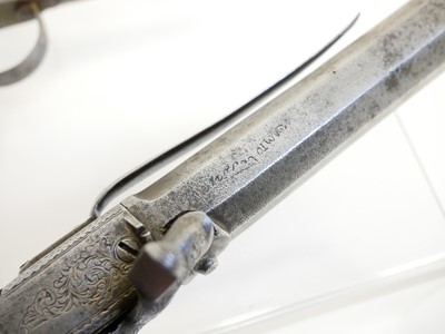 Lot 14 - Two percussion pistols, the first, an 18 bore...