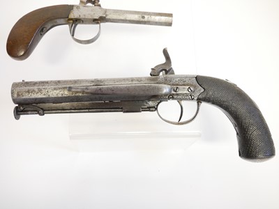 Lot 14 - Two percussion pistols, the first, an 18 bore...