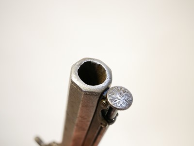 Lot 14 - Two percussion pistols, the first, an 18 bore...