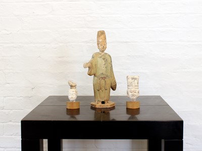 Lot 25 - A Chinese Ming Dynasty Tomb Attendant Pottery Figure