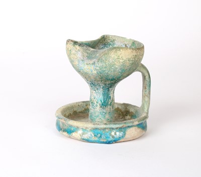Lot 9 - An Ancient Persian Nishapur Turquoise-Glazed Pottery Oil Lamp