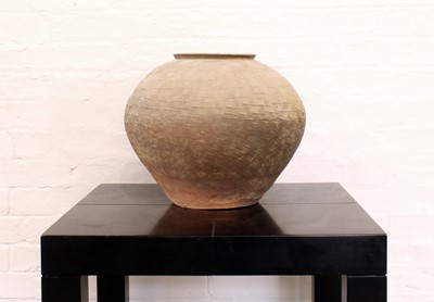 Lot 16 - A Large Chinese Warring States Period "Greyware" Pottery Jar