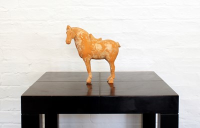 Lot 26 - A Chinese Tang Dynasty Earthenware Horse Figure