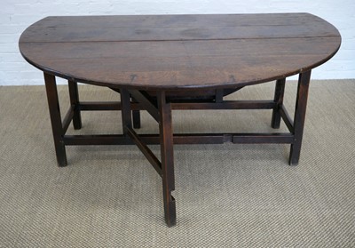 Lot 343 - A George III Oak Drop-Leaf Dining Table
