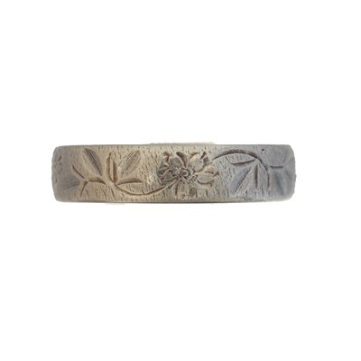 Lot 52 - A platinum band ring.