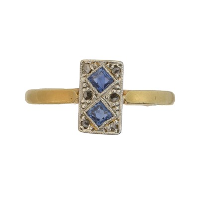 Lot 81 - An early 20th century sapphire and diamond dress ring.