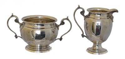 Lot 182 - A George V silver milk jug and sugar bowl