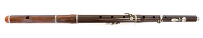 Lot 238 - Four key rosewood flute