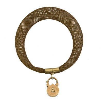 Lot 37 - A Victorian mourning hairwork bracelet and locket.