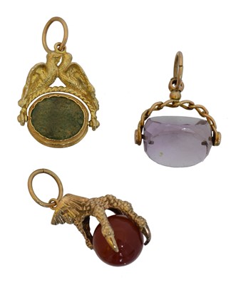 Lot 99 - Three gem-set fobs.