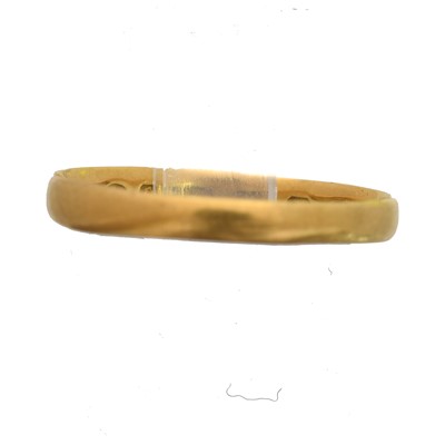 Lot 35 - A 22ct gold band ring.