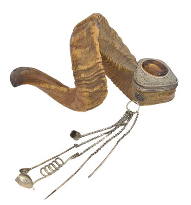 Lot 214 - A 19th century white metal Scottish ram's horn snuff mull