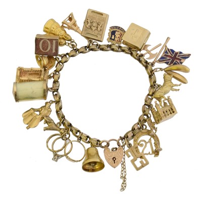 Lot 52 - A 9ct gold charm bracelet.