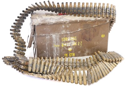 Lot 210 - Belt of fired 7.62mm cases for GPMG, in...