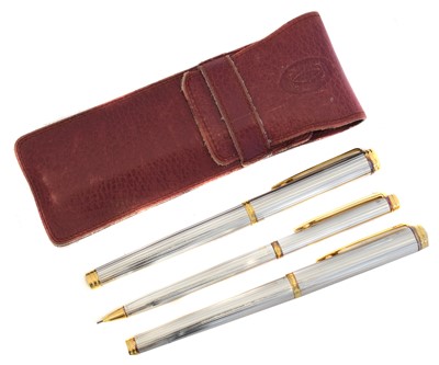 Lot 204 - Three Waterman pens in a Cartier pouch.