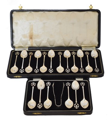 Lot 196 - Two sets of George V silver cased flatware