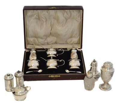 Lot 200 - A George V silver cased cruet set