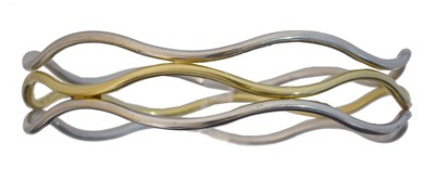 Lot 42 - An 18ct gold bangle.