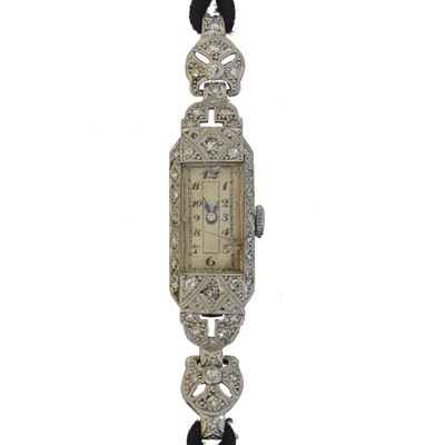 Lot 210 - An early 20th century diamond cocktail watch.
