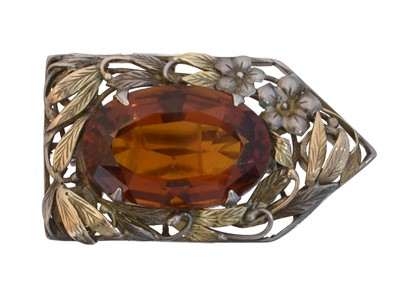 Lot 8 - A citrine Arts & Crafts brooch.