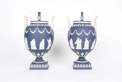 Lot 82 - A Good Pair of Wedgwood Blue Jasperware Twin-Handles Urns with Covers