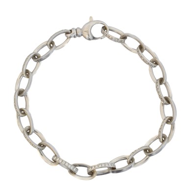 Lot 32 - An 18ct gold diamond bracelet by Theo Fennell.