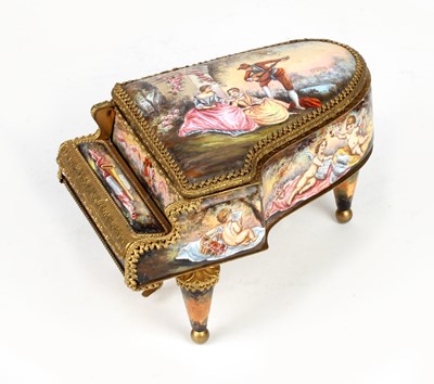 Lot 117 - A Late 19th century French Enamel and Gilt Brass Musical Trinket Box modelled as a Piano