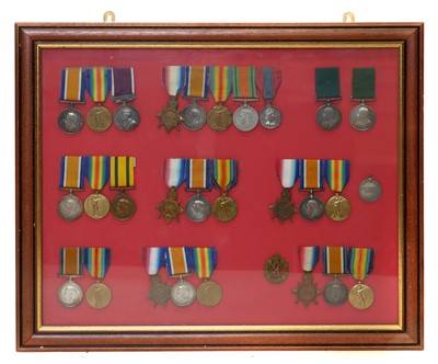 Lot 259 - Framed medal display, including eight sets of...