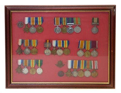 Lot 262 - Framed medal display, including seven sets of...