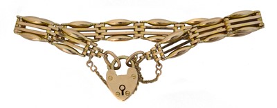 Lot 37 - A 9ct gold bracelet by Manton & Mole.