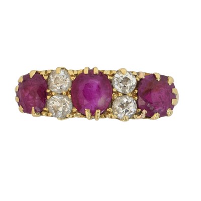 Lot 106 - An early 20th century 18ct gold ruby and diamond dress ring.