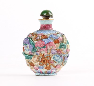 Lot 312 - A Chinese Famille Rose Relief Moulded Snuff Bottle