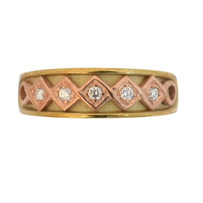 Lot 129 - A 9ct gold Clogau diamond band ring.