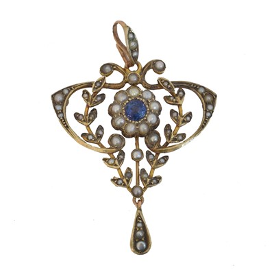 Lot 31 - An early 20th century synthetic sapphire and split pearl pendant.