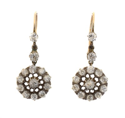 Lot 61 - A pair of diamond drop earrings.