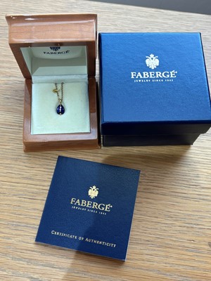 Lot 71 - An 18ct gold Fabergé enamel egg pendant on chain.