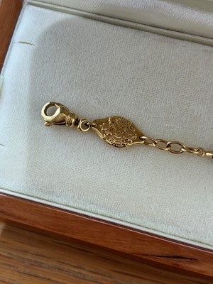 Lot 30 - An 18ct gold Fabergé enamel and diamond bracelet.