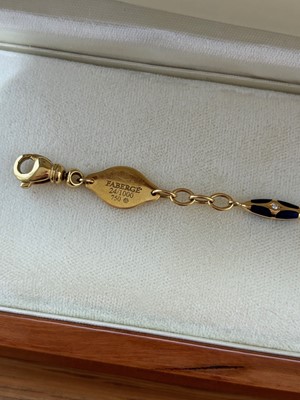Lot 30 - An 18ct gold Fabergé enamel and diamond bracelet.