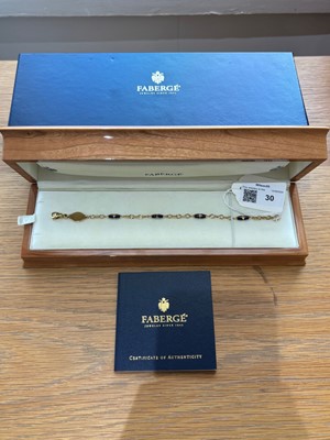 Lot 30 - An 18ct gold Fabergé enamel and diamond bracelet.