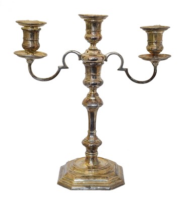 Lot 52 - An Elizabeth II silver three branch candelabra.