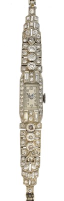 Lot 212 - An early 20th century platinum and diamond cocktail watch.